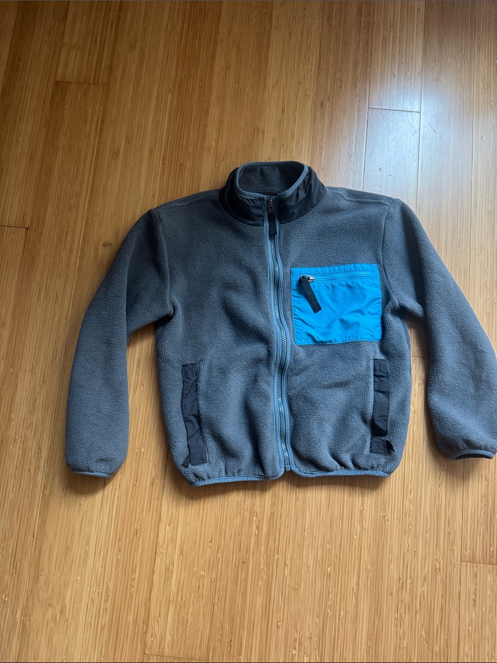 Patagonia Kids Grey Fleece Jacket with Blue Chest Pocket